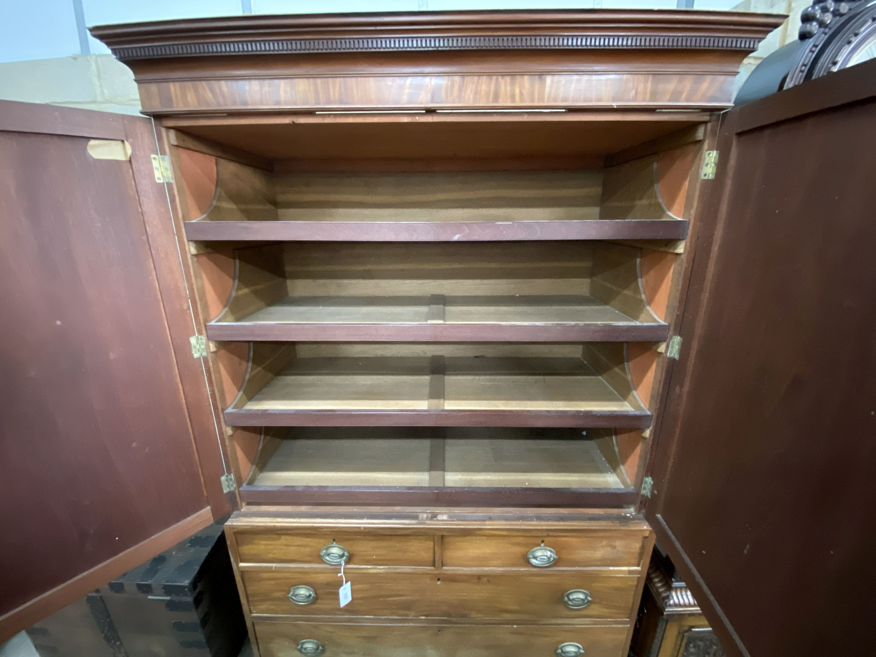 A George III mahogany linen press, width 135cm, depth 56cm, height 206cm